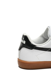 Scarpe con strappi Bianco Nero Diadora