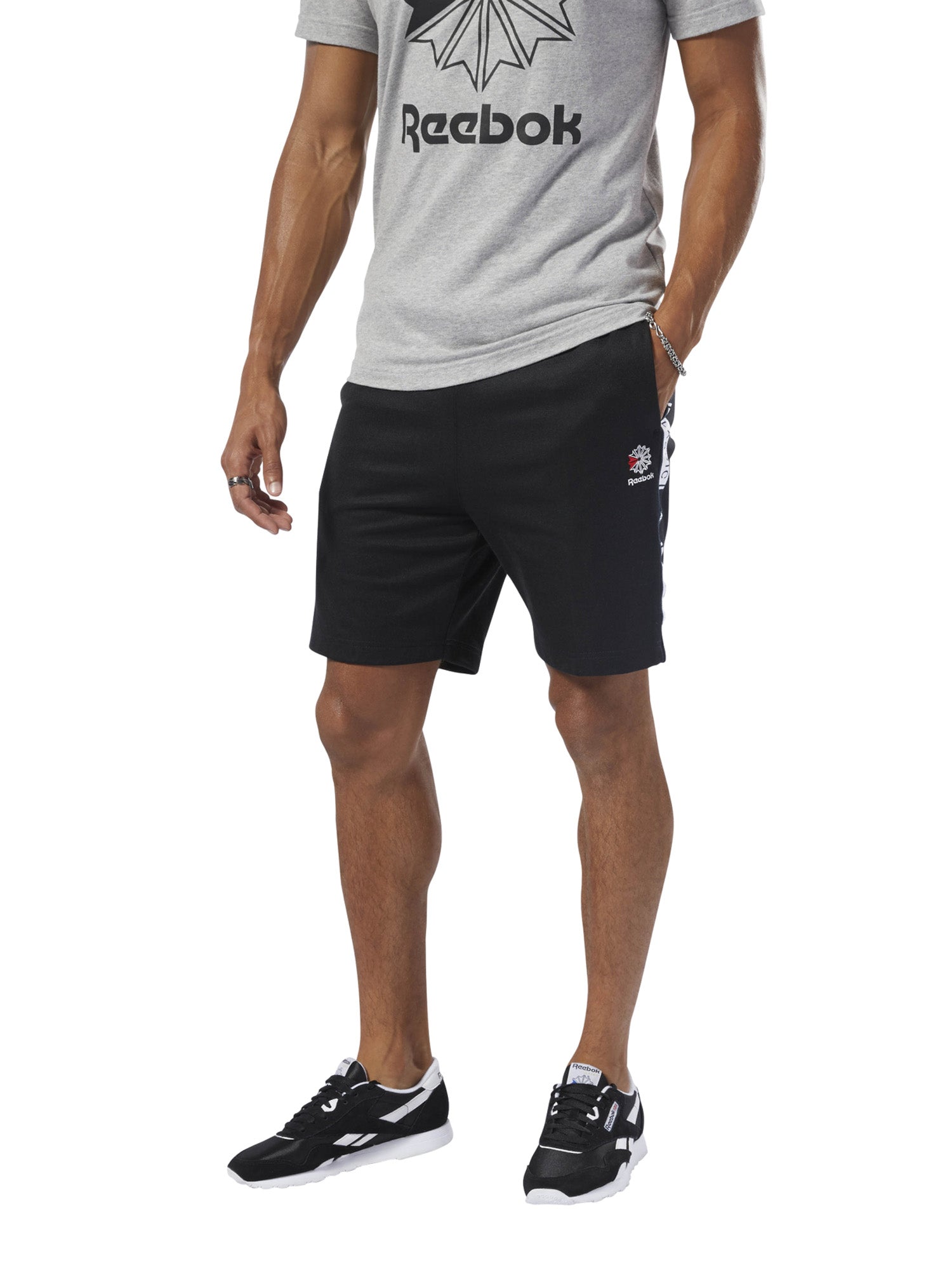 Bermudas reebok on sale